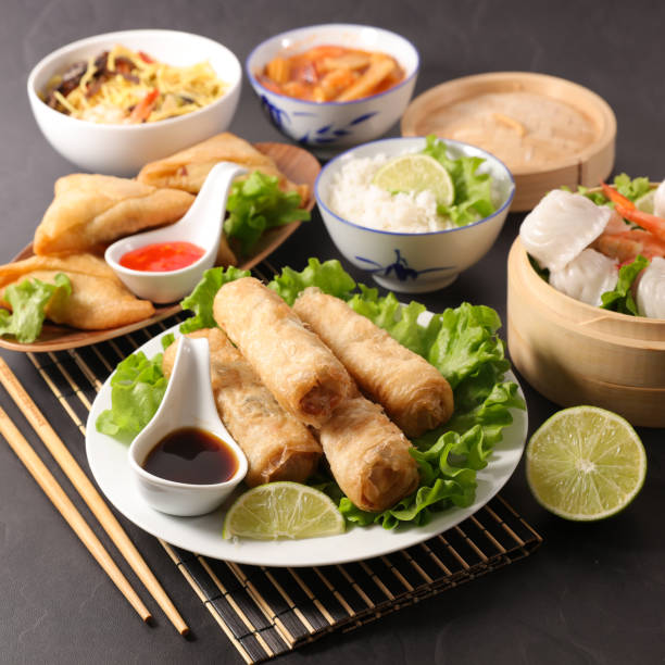 istock selection of asian meal with spring roll, samosa, fried noodles, soup 1149019168