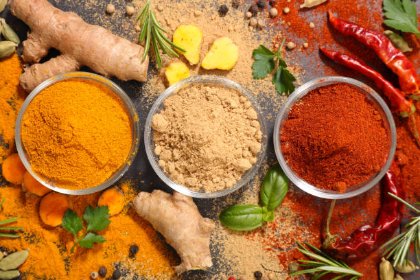 istock spices with ingredients, curry-chili-coriander-ginger 1149019198