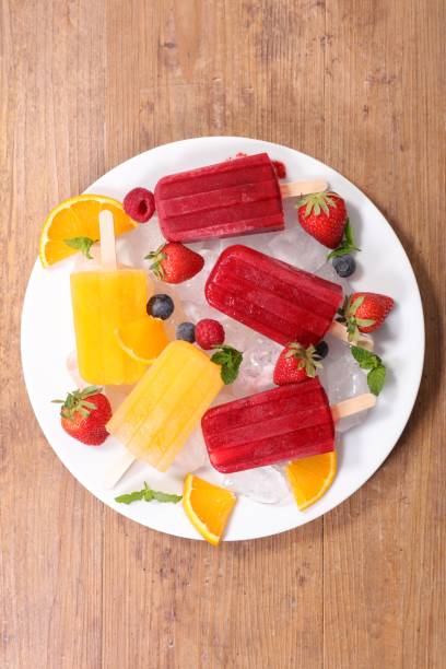istock ice cream popsicles with fruits 1149019314