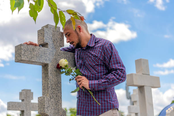 istock Man in the cemetery 1149021225
