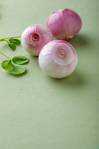 red onions on wooden board