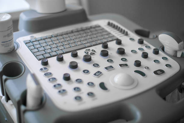 Close up in backlit high-tech ultrasound machine stock photo