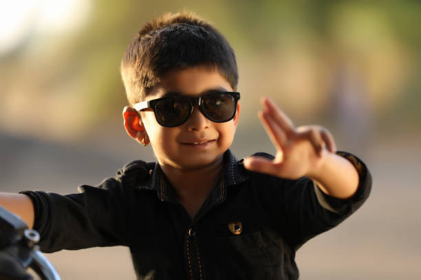 istock Cute Indian child wear sunglasses 1149027664