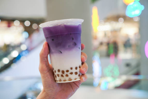 Purple Sweet Potato bubble drink. Purple Sweet Potato with golden bubble. A cup of purple sweet potato latte with milk and golden bubble. bubble tea photos stock pictures, royalty-free photos & images