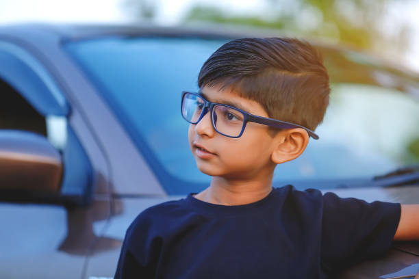 Cute Indian child wear eyeglass