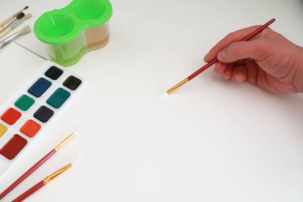 istock Drawing paints on a white sheet of paper 1149029921