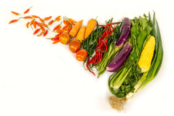 istock Top view of various fresh vegetables isolated on white 1149033027