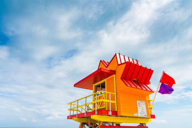 istock Orange and red lifeguard tower under a cloudy sky in Miami Beach 1149033200
