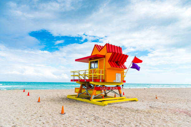 istock Colorful lifeguard tower in Miami Beach under a cloudy sky 1149033313