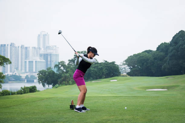 istock Female golfer shoots for the green 1149033318