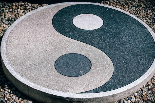 istock Yin Yang Symbol Stone on the Ground 1149035026