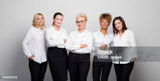 Confident Businesswomen Against White Background Stock Photo - Download Image Now - Only Women, Studio Shot, New Business