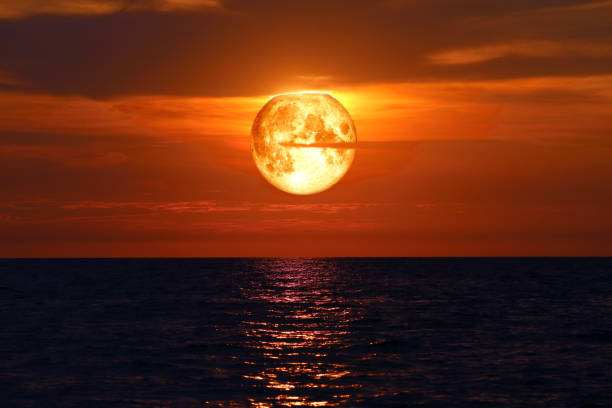 istock full blood moon on night sky over sea silhouette cloud 1149038091