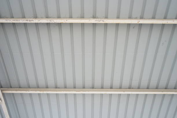 istock Roof frame and metal sheet in building construction 1149039005