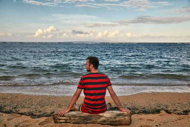istock Man enjoying on a deserted tropical beach. 1149041508