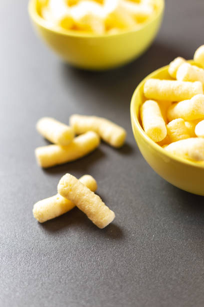 istock Crunchy corn puffs, pufuleti in bowl. 1149041641