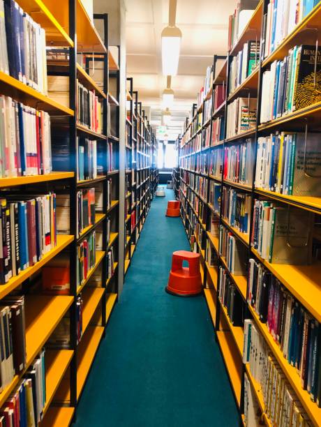 istock Library aisle with bookshelves 1149044828