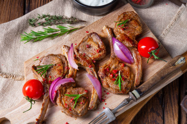 istock Tasty Lamb chops with mint and rosemary 1149046772