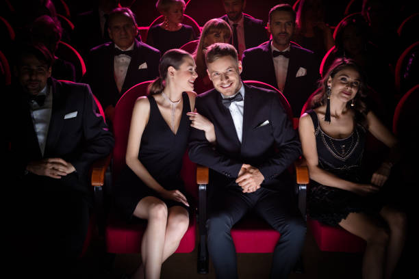 istock Happy couple enjoying theatrical performance 1149049104