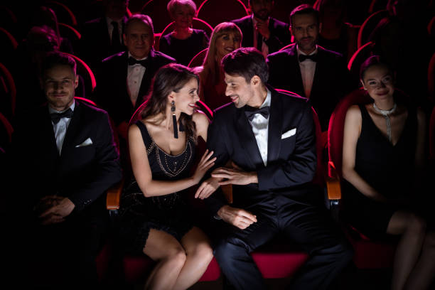 istock Romantic couple looking at each other in theater 1149049631