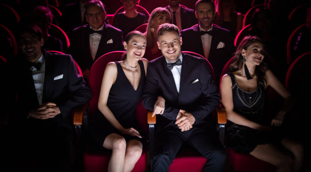 istock Smiling couple watching theatrical performance 1149050312