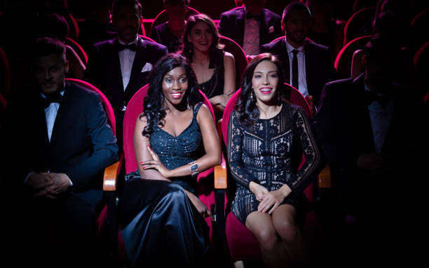 istock Young female friends enjoying watching opera 1149050428