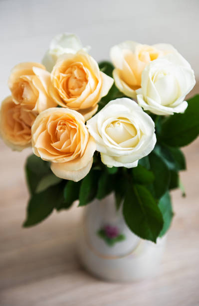 istock Yellow and white roses 1149051534