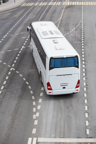 istock White tourist bus at the intersection 1149057492