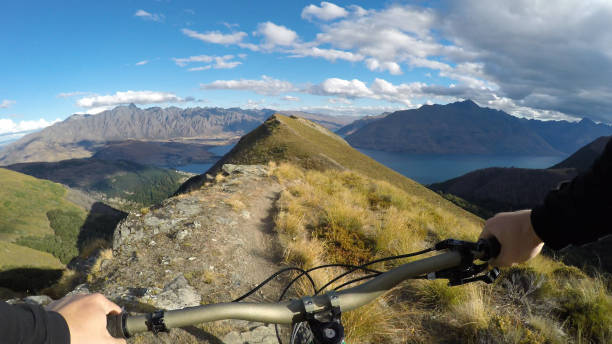 istock POV of bicyclist descending mountain path 1149058316