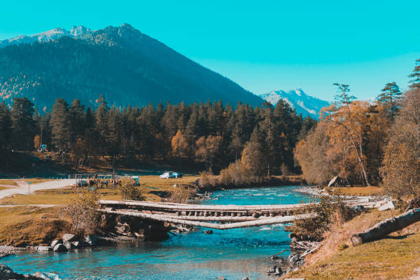 istock Old bridge over the river in the countryside 1149059584