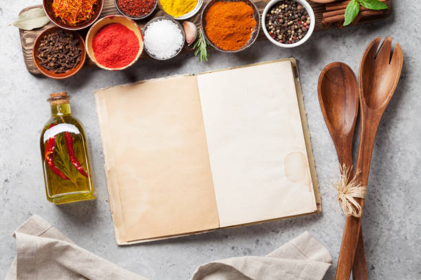 istock Set of various spices and herbs and cookbook 1149059668