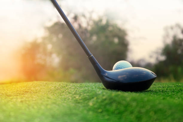 istock Golf clubs and golf balls on a green lawn 1149059773