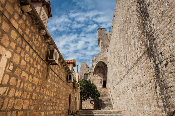 Back of the Minceta Tower on the beautiful walls of Dubrovnik old town Dubrovnik, Croatia - April, 2018: Back of the Minceta Tower on the beautiful walls of Dubrovnik old town fort minceta dubrovnik stock pictures, royalty-free photos & images