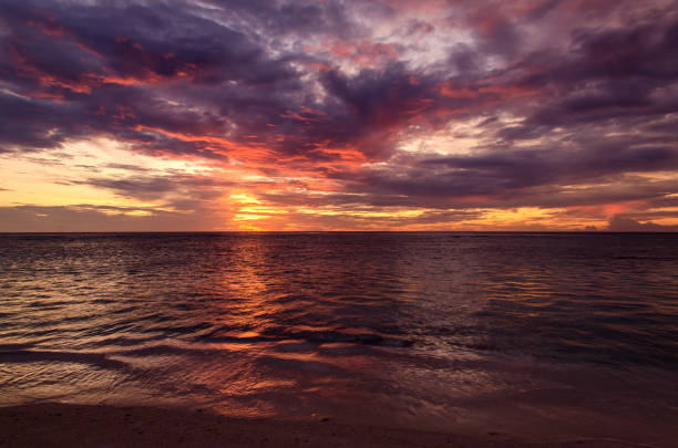 istock Beautiful sunrise over the tropical beach 1149064271