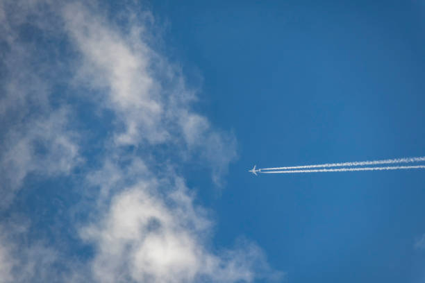 istock airplane flying at high altitude and clear blue sky 1149065534