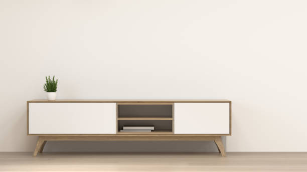 istock clean modern  wood cabinet in empty room interior background  3d rendering home designs,background shelves and books on the desk in front of  wall empty wall 1149065618