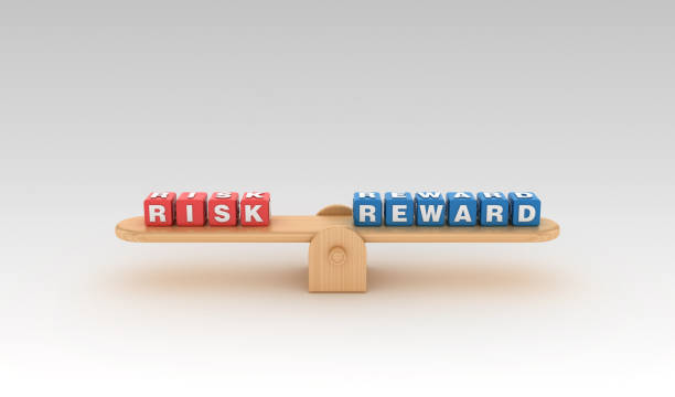 istock Seesaw with RISK REWARD Buzzword Cubes - 3D Rendering 1149067856