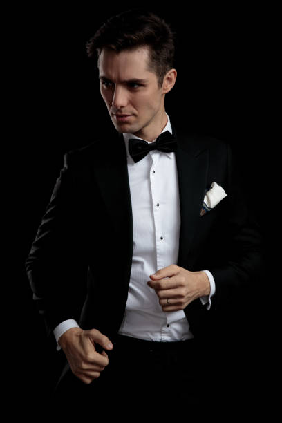 istock focused guy looking away with hand on lounge jacket 1149068183