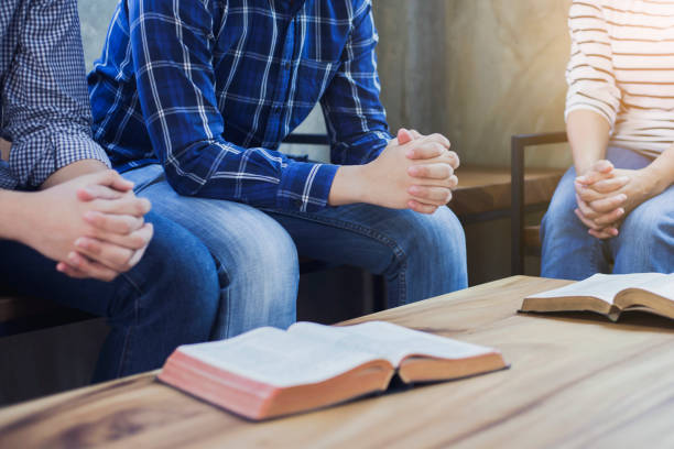 istock Christian people pray together 1149069608