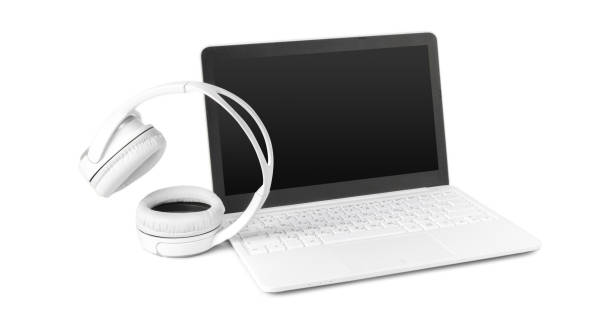 istock laptop and headphone isolated on white 1149071215