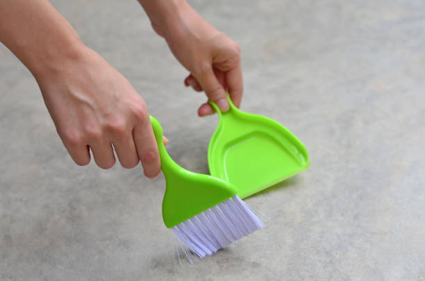 Plastic broom for sweeping floors.
