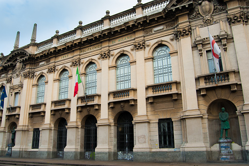 Street view of City Hall at Plaça de Sant Jaume in the Gothic Quarter of Barcelona, Spain. People walking by.