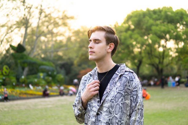 istock Young man relaxing in the park 1149072916