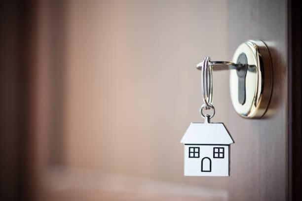 istock House key in the door 1149073617
