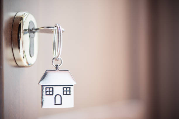 istock House key in the door 1149073709