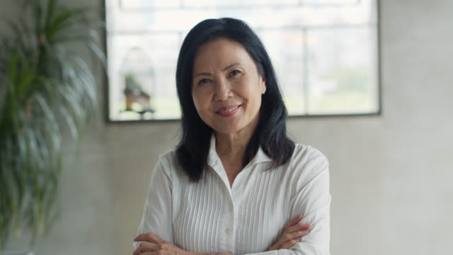 Portrait of Asian Businesswoman Crossing Arms