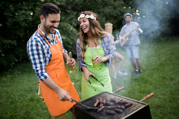 istock Group of friends having fun in nature doing bbq 1149074174