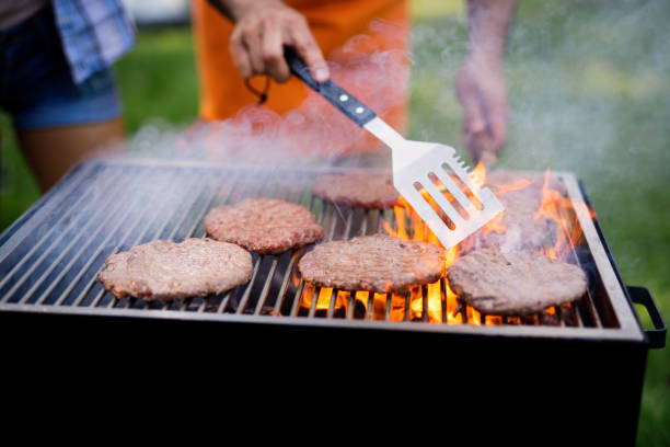 istock Delicious assorted grilled meat with vegetables over the coals on barbecue 1149074225
