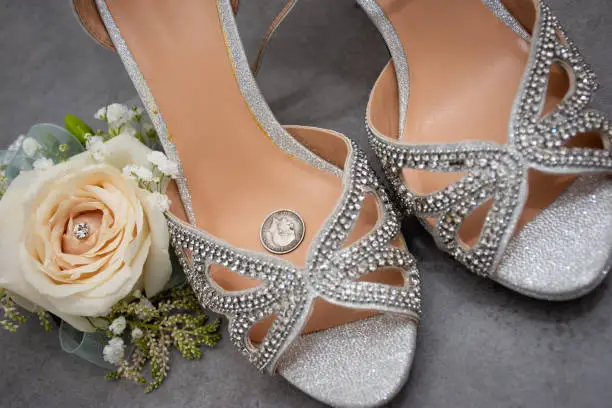 Sixpence goodluck charm in wedding shoes a tradition for good luck
