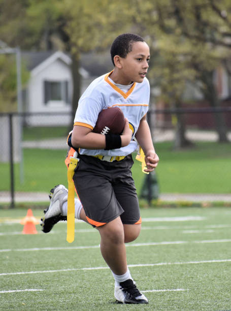 Flag Football:  Player Carrying the Ball stock photo